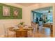 Inviting dining area featuring modern decor, comfortable seating, and views into the living room at 1709 E Loretta Dr, Indianapolis, IN 46227
