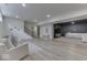 Finished basement with a bar, seating area, and stairs leading to the upper level at 17346 Newton Main St, Westfield, IN 46074