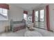 Bright, airy bedroom with French doors and windows bringing in lots of natural light at 17346 Newton Main St, Westfield, IN 46074