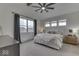 Bedroom features plush carpet, neutral walls, and modern ceiling fan at 17346 Newton Main St, Westfield, IN 46074