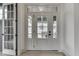 Bright entryway featuring glass paneled doors and transom window at 17346 Newton Main St, Westfield, IN 46074