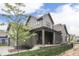 Charming two-story home with a covered front porch and landscaped yard at 17346 Newton Main St, Westfield, IN 46074