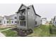 Modern farmhouse exterior featuring vertical siding and clean landscaping at 17346 Newton Main St, Westfield, IN 46074