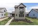 Charming craftsman-style home featuring board and batten siding and a small balcony at 17346 Newton Main St, Westfield, IN 46074
