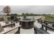 Outdoor community fire pit surrounded by Adirondack chairs, ideal for evening socializing and relaxation at 17346 Newton Main St, Westfield, IN 46074