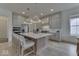 Open concept kitchen with large kitchen island, stainless steel appliances, and modern cabinets at 17346 Newton Main St, Westfield, IN 46074