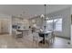 Bright kitchen and dining area with modern pendant lighting at 17346 Newton Main St, Westfield, IN 46074