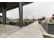Community outdoor dining area featuring barbecue grills and string lights, perfect for gatherings at 17346 Newton Main St, Westfield, IN 46074