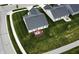Aerial view of the property showcasing the backyard, deck, and surrounding neighborhood at 17949 Scout Ln, Westfield, IN 46074