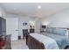Cozy main bedroom with a glimpse into the attached bathroom at 17949 Scout Ln, Westfield, IN 46074