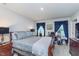 Comfortable main bedroom with natural light, plush carpeting, and neutral decor at 17949 Scout Ln, Westfield, IN 46074