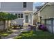 Lovely backyard patio with an outdoor dining area and comfortable seating, perfect for enjoying the outdoors at 2016 Central Ave, Indianapolis, IN 46202