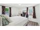 Comfortable bedroom with neutral decor, ample natural light, and stylish accents at 2025 E Broadway St, Fortville, IN 46040