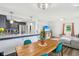 Inviting dining area with modern table and chairs, seamlessly connected to the living space at 2025 E Broadway St, Fortville, IN 46040