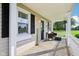 Charming porch with seating area, perfect for relaxing and enjoying the outdoors at 2025 E Broadway St, Fortville, IN 46040