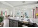 Open-concept kitchen overlooking the living and dining areas, perfect for entertaining at 2025 E Broadway St, Fortville, IN 46040