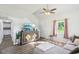 Cozy living room with vaulted ceiling, comfortable seating, and a stylish entertainment center at 2025 E Broadway St, Fortville, IN 46040