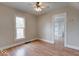 A bedroom with hardwood floors, neutral paint and a ceiling fan at 2154 Barth Ave, Indianapolis, IN 46203