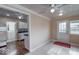 Cozy dining room connects to the kitchen and includes an exterior door and windows at 2154 Barth Ave, Indianapolis, IN 46203