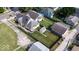 The exterior of a charming house with a fenced backyard and a detached garage at 2154 Barth Ave, Indianapolis, IN 46203