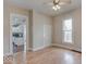 This large living room has hardwood floors, neutral paint and is steps from the Kitchen at 2154 Barth Ave, Indianapolis, IN 46203
