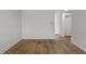 Bright living room featuring hardwood floors, neutral walls, and modern electrical outlets at 2344 N Leland Ave, Indianapolis, IN 46218