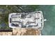 Aerial view of a pontoon boat featuring comfortable seating and a modern console on a tranquil lake at 3602 Bay Rd S Dr, Indianapolis, IN 46240