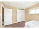 Comfortable bedroom showcasing closet and soothing color scheme at 3723 S Dearborn St, Indianapolis, IN 46237