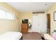 Well-lit bedroom with neutral walls, closet, and comfortable decor at 3723 S Dearborn St, Indianapolis, IN 46237