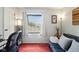 This bedroom has a window with curtains and contains a futon and desk at 4505 Stratford Dr, Anderson, IN 46013