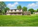 Charming two-story townhouse with a well-maintained lawn and inviting curb appeal at 4505 Stratford Dr, Anderson, IN 46013
