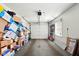 This garage is stuffed with boxes and has a white automatic garage door and one window at 4505 Stratford Dr, Anderson, IN 46013