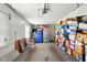 This garage contains a lot of boxes, some storage containers, and a work bench on the side at 4505 Stratford Dr, Anderson, IN 46013