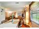 Spacious living room flowing from dining area, great for entertaining at 4505 Stratford Dr, Anderson, IN 46013