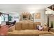 Comfortable living room featuring a large sectional sofa, dining room and neutral decor at 4505 Stratford Dr, Anderson, IN 46013