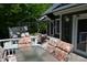Relaxing back deck with outdoor seating, perfect for entertaining guests and enjoying the tranquil setting at 455 E Main St, Danville, IN 46122