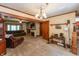 Inviting living room with a fireplace, comfortable seating, and built-in bookshelves at 455 E Main St, Danville, IN 46122