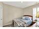 Cozy bedroom featuring a comfortable bed, window with blinds, and traditional-style furnishings at 5248 Holborn Ave, McCordsville, IN 46055