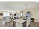 Open kitchen view with stainless steel appliances, quartz countertops, and modern cabinetry at 5248 Holborn Ave, McCordsville, IN 46055