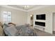 Main bedroom featuring neutral tones, a chandelier, and ensuite access at 5248 Holborn Ave, McCordsville, IN 46055