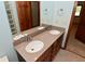 Bathroom boasting a double sink vanity with granite countertop and large mirror at 5361 Carnoustie Cir, Avon, IN 46123
