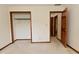 Bedroom featuring a closet with custom shelving and a doorway leading to another room at 5361 Carnoustie Cir, Avon, IN 46123