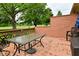 Outdoor deck with table and chairs, perfect for enjoying outdoor meals and gatherings at 5361 Carnoustie Cir, Avon, IN 46123