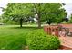 Charming deck with outdoor seating overlooking a well-manicured lawn at 5361 Carnoustie Cir, Avon, IN 46123
