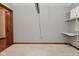 A versatile space featuring neutral carpet and built-in shelving to maximize storage at 5361 Carnoustie Cir, Avon, IN 46123