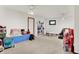 Finished basement featuring ample play space, recreational areas, and bright lighting, ideal for entertainment and relaxation at 5377 Crooked Stick Ct, Greenwood, IN 46142