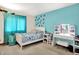 Bright bedroom featuring carpet flooring, a twin bed and accent lighting at 5377 Crooked Stick Ct, Greenwood, IN 46142