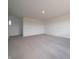 Spacious bedroom with plush carpeting and a window for natural light at 5540 Tart Blvd, Indianapolis, IN 46239