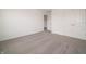 Bright bedroom features neutral carpet and a double door closet perfect for a bedroom at 5540 Tart Blvd, Indianapolis, IN 46239