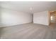 Large bedroom with neutral carpeting, closet and doorway at 5540 Tart Blvd, Indianapolis, IN 46239